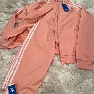 Adidas tracksuit in Peach